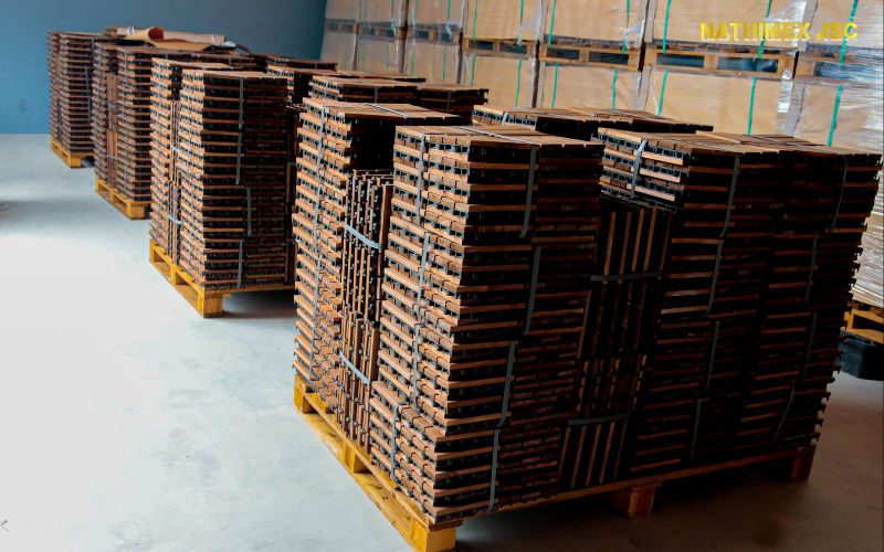 Packing-wood-deck-tiles-at-nathimex-factory